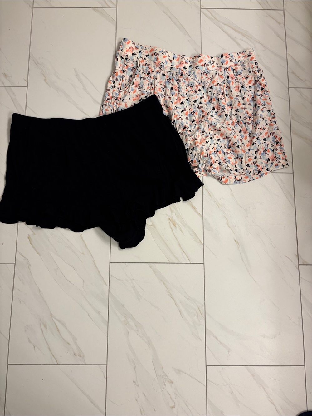 2 pairs of torrid shorts Black Ruffle Hem Shorts + Floral Print